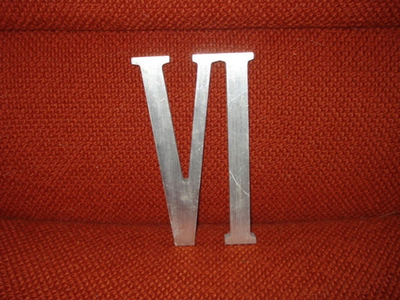 Vintage aluminum roman numeral vi or 6