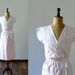 Vintage 1970s light pink wrap cotton dress. palm tree print summer dress