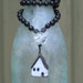 house with full moon long necklace....