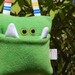 Lime Green Monster Tooth Fairy Pocket Pillow with Multicolored Striped Ribbon