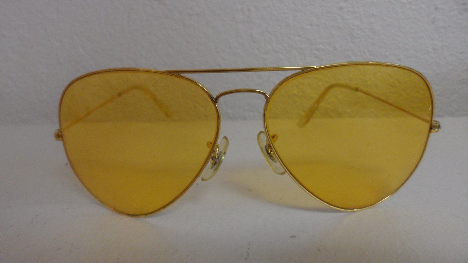 bushnell gold frame aviator shooting sunglasses amber yellow