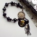 Steampunk Charm Bracelet light bulb charm vintage black crystal beads- The Lightbulb Dancer