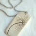 Earthy Porcelain Pendant with Impression of a leaf.