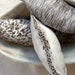 Three sculpted seed pods. Sold as a set.