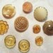 Beautiful Antique and Vintage Golden and Taupe Glass Buttons, 10 in lot - 1930's