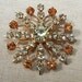 vintage sunburst rhinestone brooch