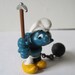 1980 CHAIN GANG Super Smurf with Rock ... vintage Schleich Peyo Figurine