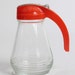 Vintage Red Handled Syrup Pitcher