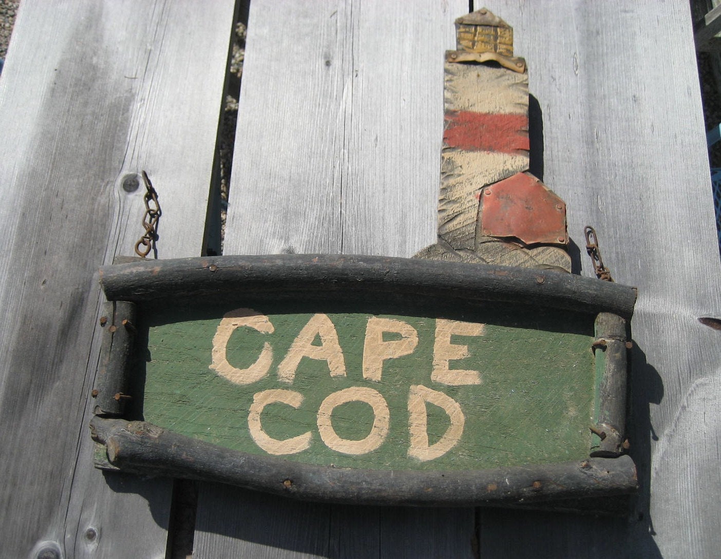big wooden handmade vintage Cape Cod lighthouse sign