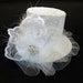 White Mini Top Hat with Feathers and Silver Toned Rhinestone Button Weddings Races Special Occasions