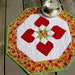 Tulip Time 19 inch RESERVED quilted table centerpiece in red, orange, yellow, kiwi
