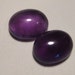 Amethyst cabs ..... 2 pieces ............ 10 x 8 x 4 mm ..... 607