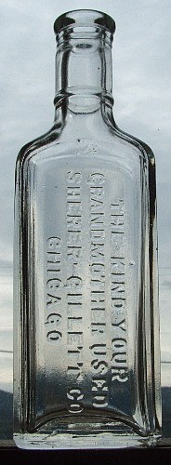 Antique FLAVORING EXTRACT bottle embossed The Kind Your