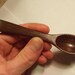 Hand carved baby spoon in rich black walnut