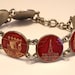 Vintage Paris souvenir coin bracelet. Red enamel. Eiffel Tower. Sacre Coeur etc