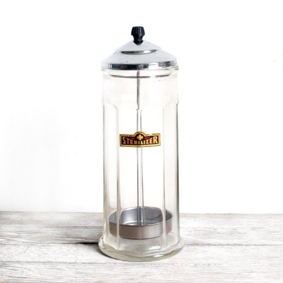 vintage barber shop's barbicide sterilizer jar
