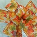 Colorful autumn leaves bow