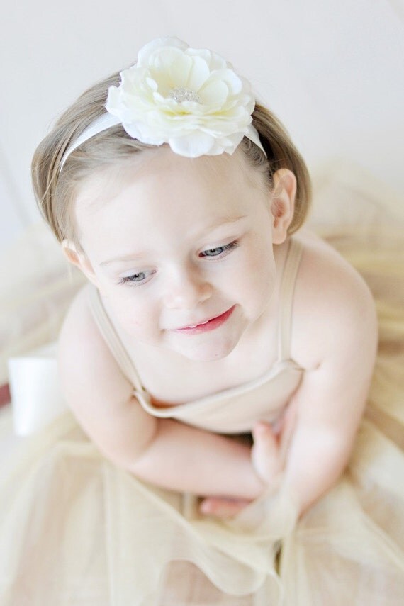 closeup of beautiful baby with flower headband stock photo ivory flower headband on soft white elastic for closeup of beautiful baby with flower headband stock photo ivory flower headband on soft white elastic for