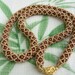 Goldstone Woven Bead Necklace In X and O Rope Pattern - 24 Inches