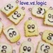 5 Smiling Bread Lucite Charms.