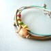 Fish leather bracelet in brass, silver and bronze