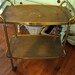 Vintage rolling kitchen tray or bar cart Wood grain look on Casters two tier