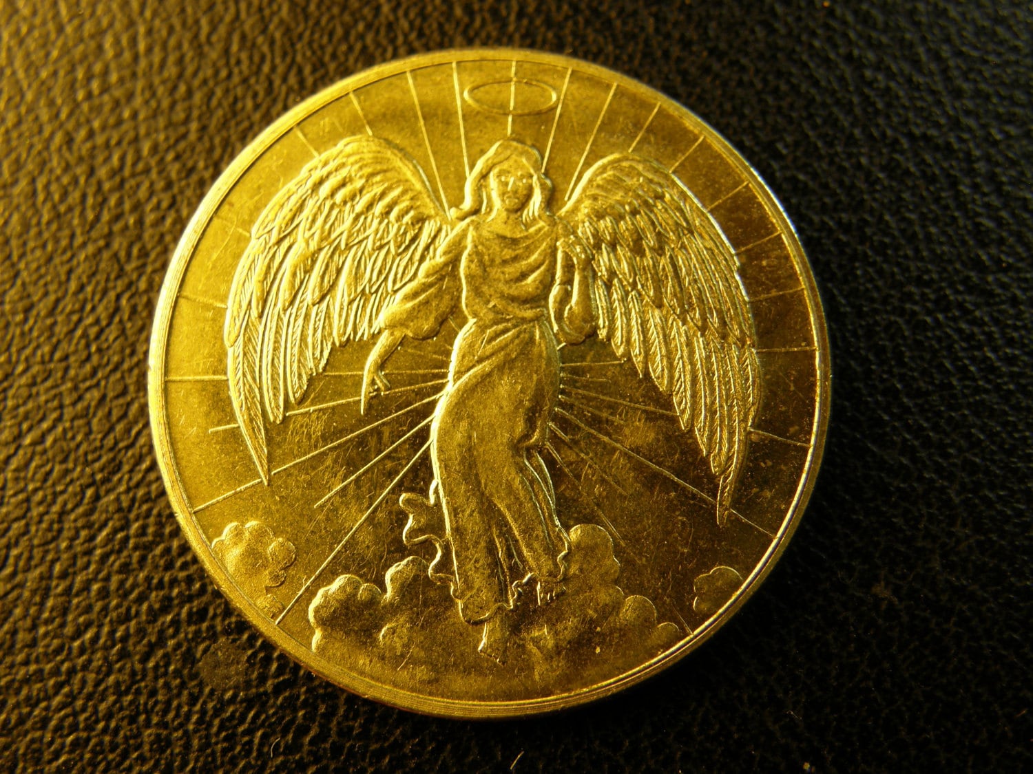coin with angel on it