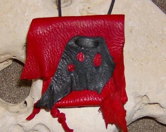 Lady Bug- This Wisdom Pouch features Red and Black Leather and is on an adjustable cord