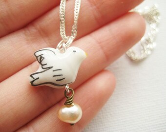LAST ONE Sterling silver necklace with porcelain dove and freshwater pearl - Un petit morceau de mon coeur