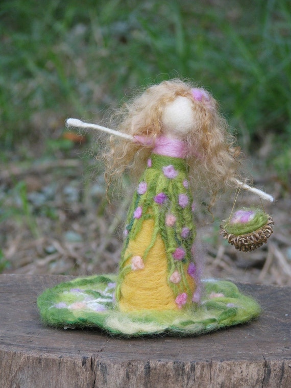 Needle felted maiden bringing a spring make to order