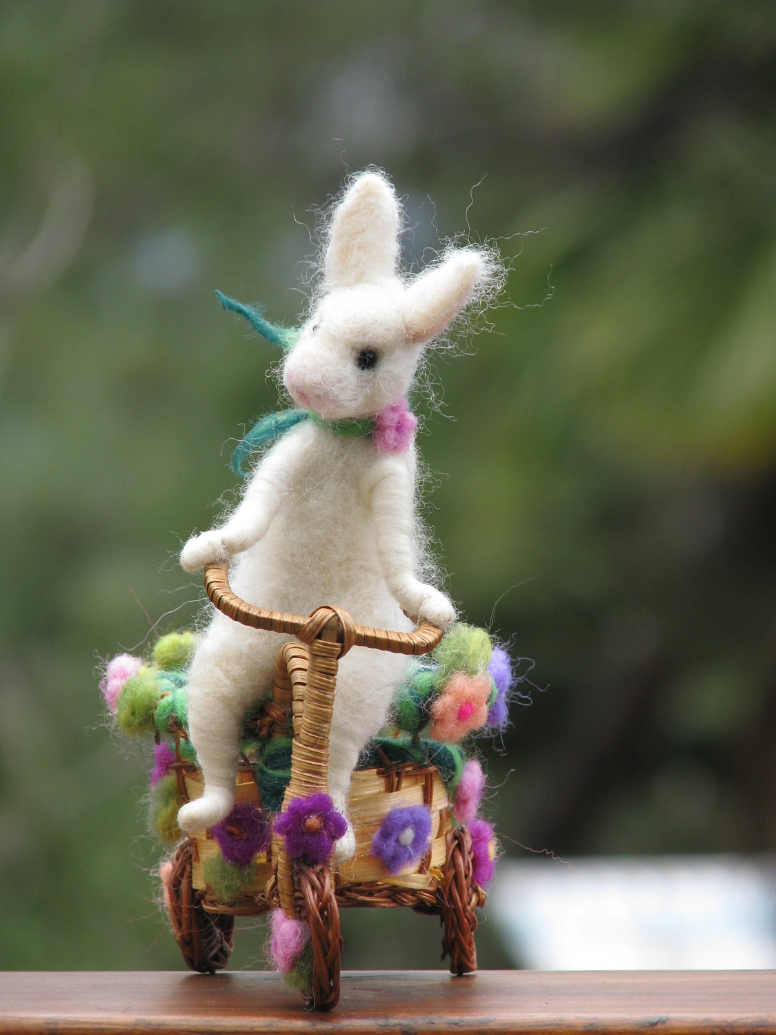 Needle felted white bunny riding bike spring home decoration