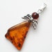 Angel pendant from natural Baltic amber