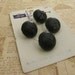 Card of 4 Leather Buttons