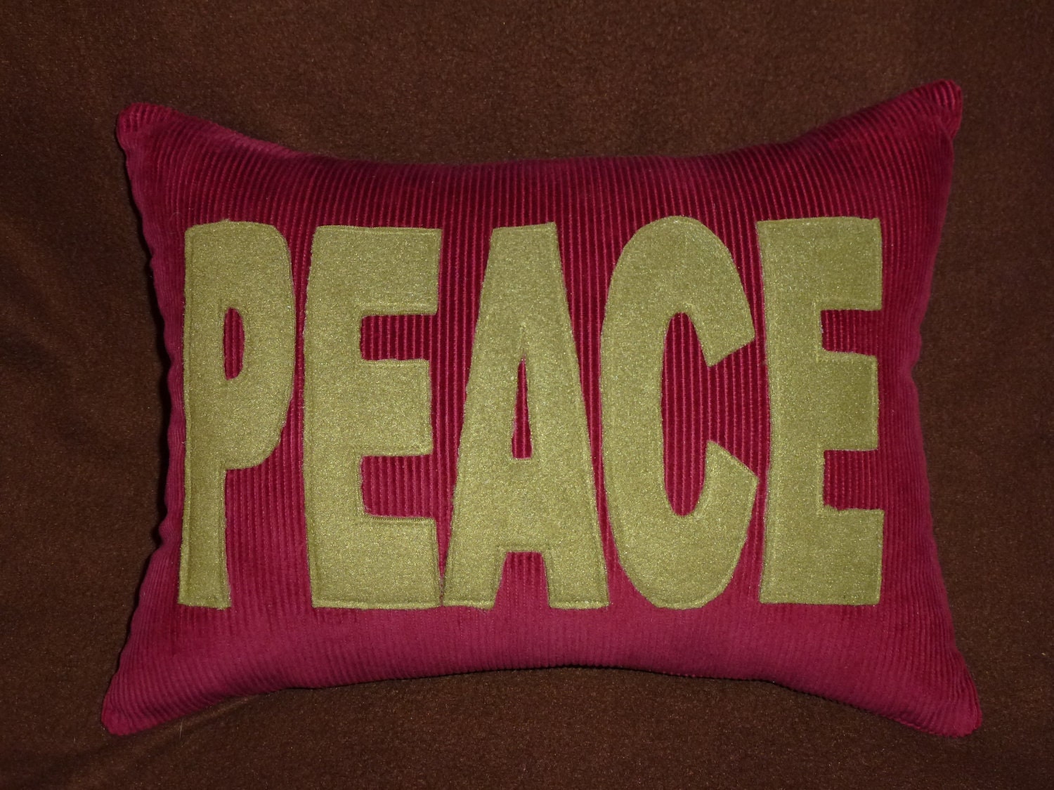 PEACE Pillow Cranberry Red with Olive Green Letters
