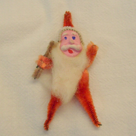 Vintage pipe cleaner Santa Claus with clay or composition face