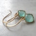 earrings: aqua chalcedony milky aquamarine mint faceted cz cubic zirconia and gold drops on handcrafted brass french ear-wires