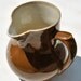 Unusual Rustic Pitcher: Offset Handle, Tobacco Brown Glazed Pottery