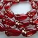 25 Czech Glass Tulips in Transparent Red with Gold Inlay 8x12mm