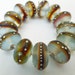 13 Handmade Glass Beads in Matte Translucent Sea Glass Blue and Fine Silver by SRA Sarah Klopping