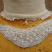 Cute embroidered and beaded applique ivory color