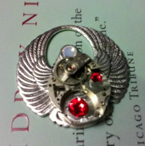 Items similar to Clockwork Angel A Steampunk Necklace in Antiqued