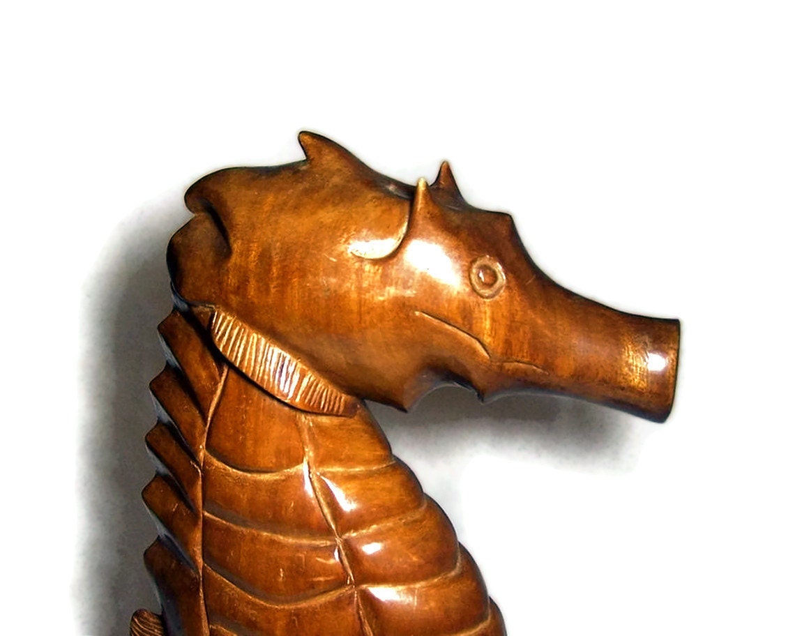 wooden seahorse statue