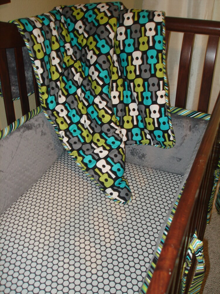 Custom fitted crib sheet in Retro wagons and by SweetDreamsBedding