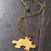 SweeT SaLe . You complete me. Golden brass puzzle piece necklace. Unisex