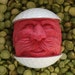 Hand Carved Red Caricature Golf Ball with a Mustache
