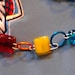 fused glass dangle earrings orange yellow blue Thunder colors