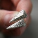 spike post earrings in shimmery white