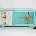 Vintage Turquoise Zenith Clock Radio