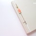 Fly. Bookmark with handprinted wooden charm and golden dove