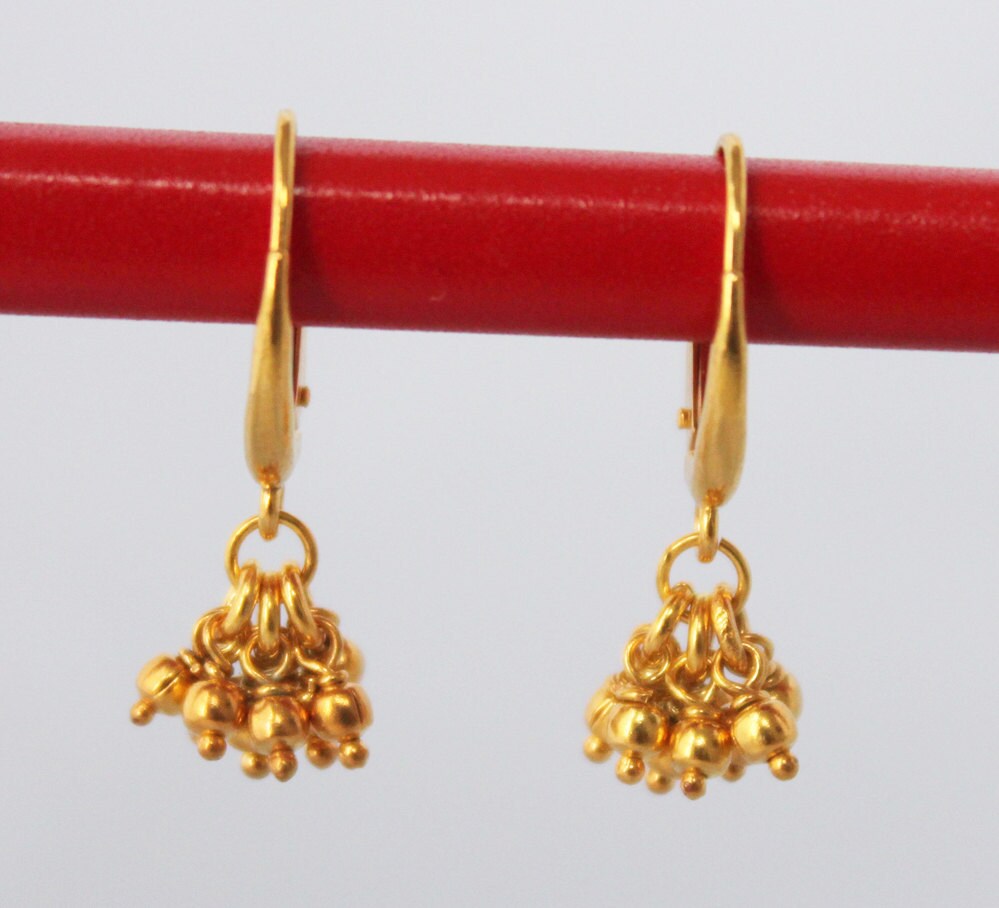 delicate gold earrings